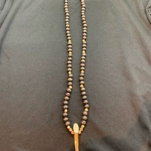 Stylish women’s boho long wooden beaded necklace.
